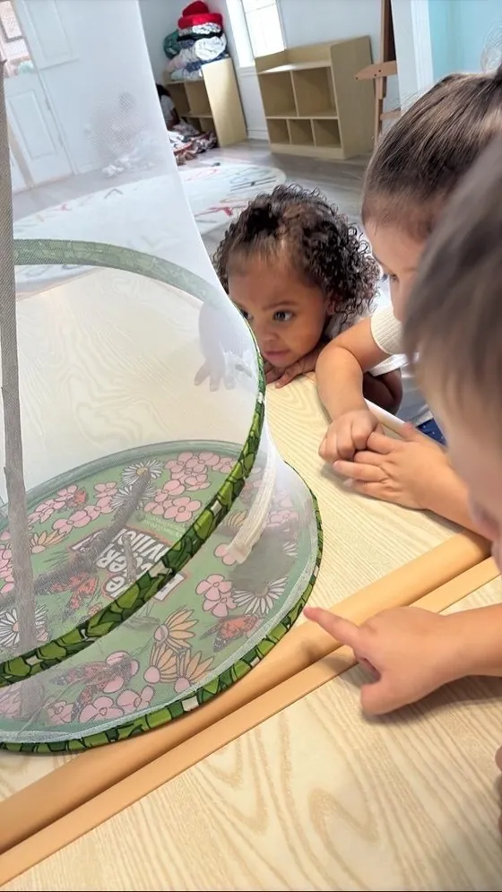 Children exploring a sensory table at Bright Haven