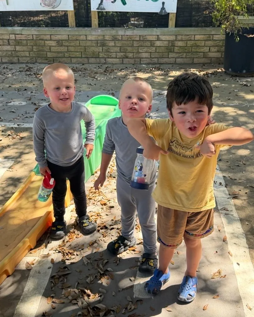 School-age children playing outside at Bright Haven